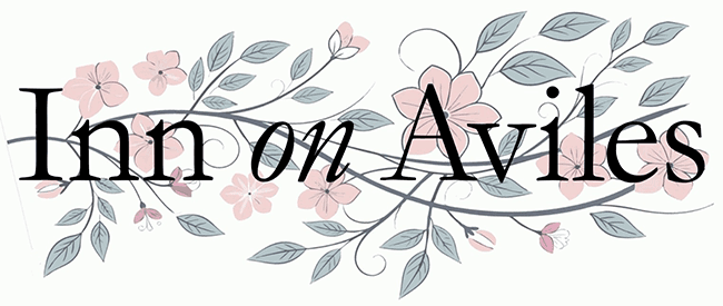 Text logo for "Inn on Aviles" with floral design elements.